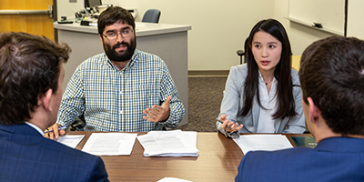 Law students argue during the Jaffe Transactional Law Competition